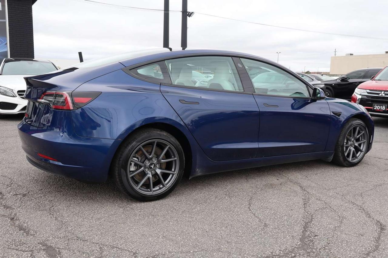 2023 Tesla Model 3 Standard Range Plus White Interior Photo