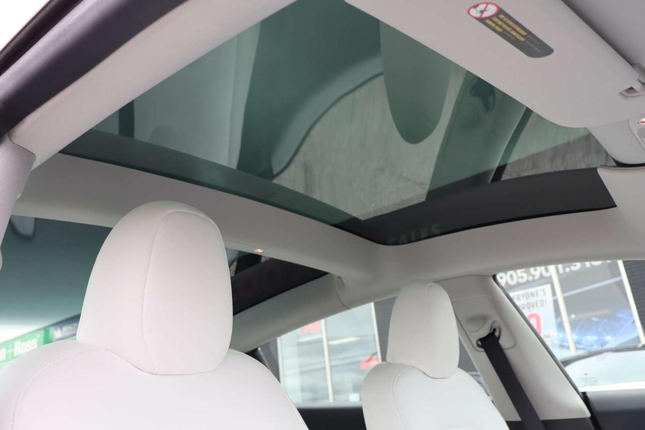 2023 Tesla Model 3 Standard Range Plus White Interior Photo