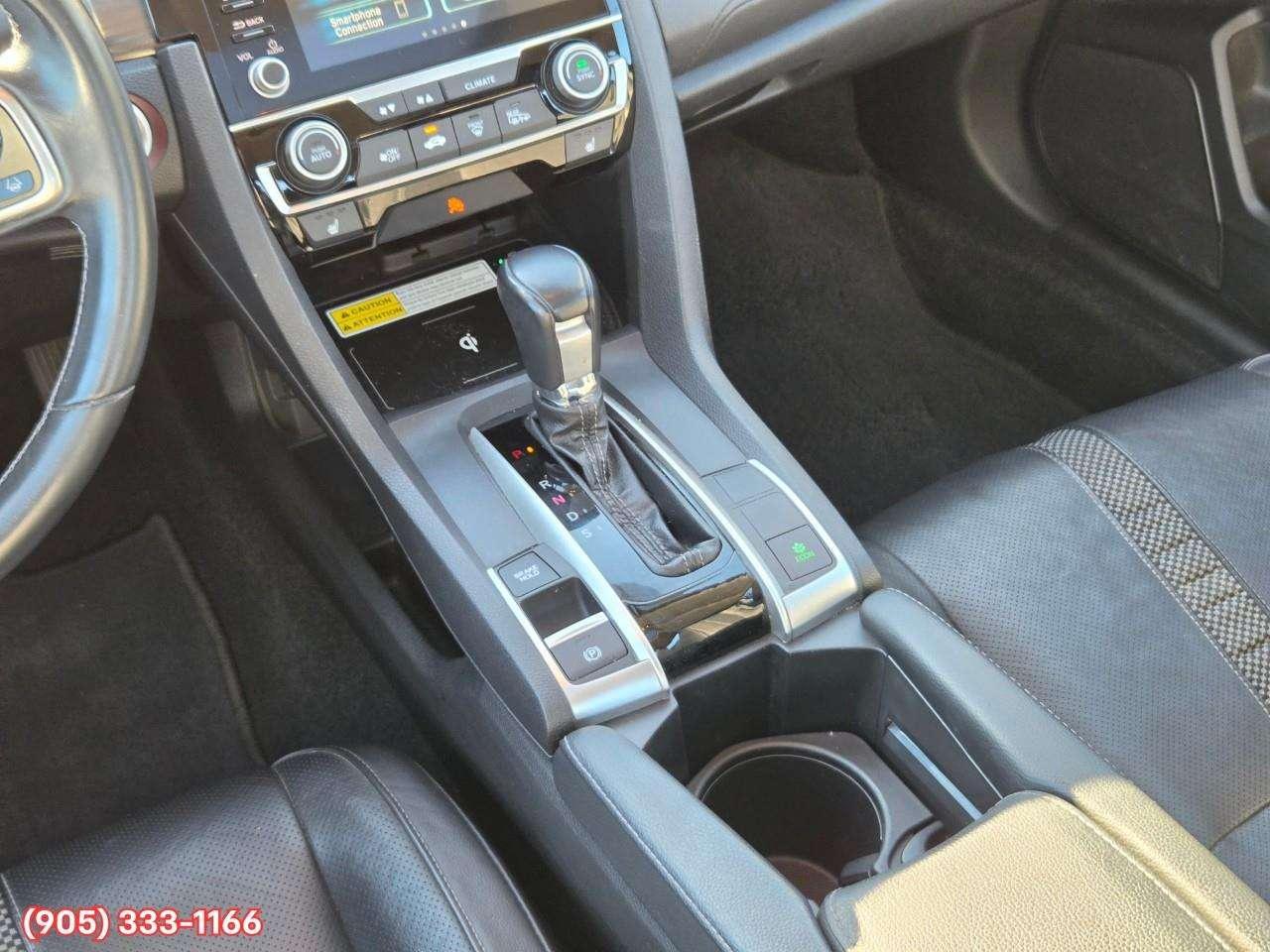 2019 Honda Civic Touring Apple CarPlay & Android Auto • Power Sunroof • Leather Seating • Built-In Navigation System • Remote Start System Photo