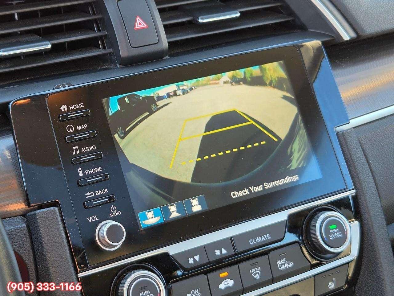2019 Honda Civic Touring Apple CarPlay & Android Auto • Power Sunroof • Leather Seating • Built-In Navigation System • Remote Start System Photo