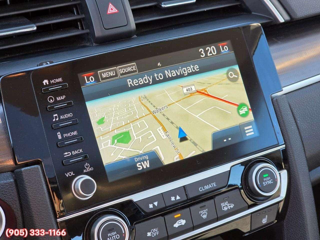 2019 Honda Civic Touring Apple CarPlay & Android Auto • Power Sunroof • Leather Seating • Built-In Navigation System • Remote Start System Photo