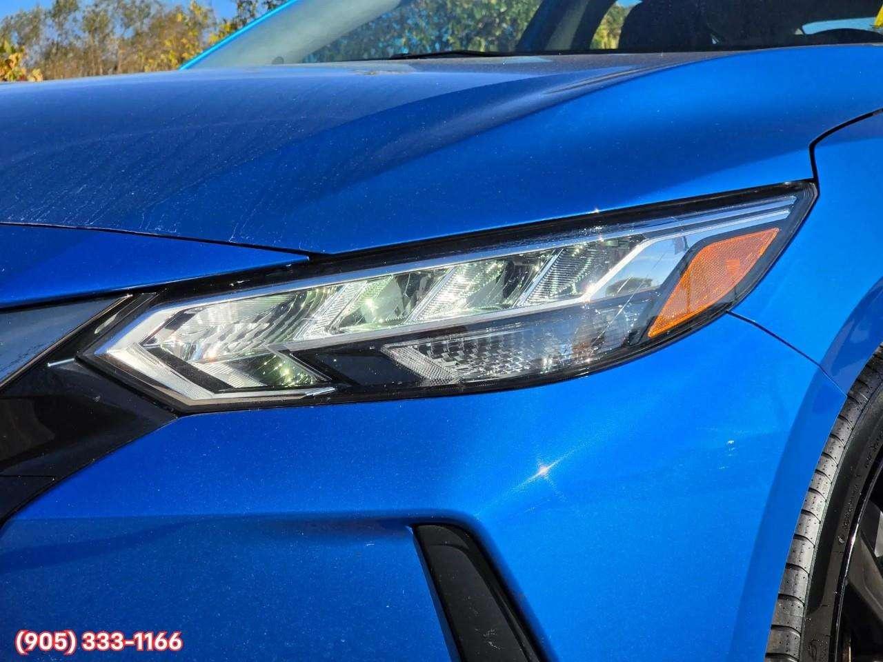 2023 Nissan Sentra SR Apple CarPlay & Android Auto • Power Sunroof • Heated Front Seats • Lane Assist • Rear Parking Sensors • SiriusXM® Sat Photo