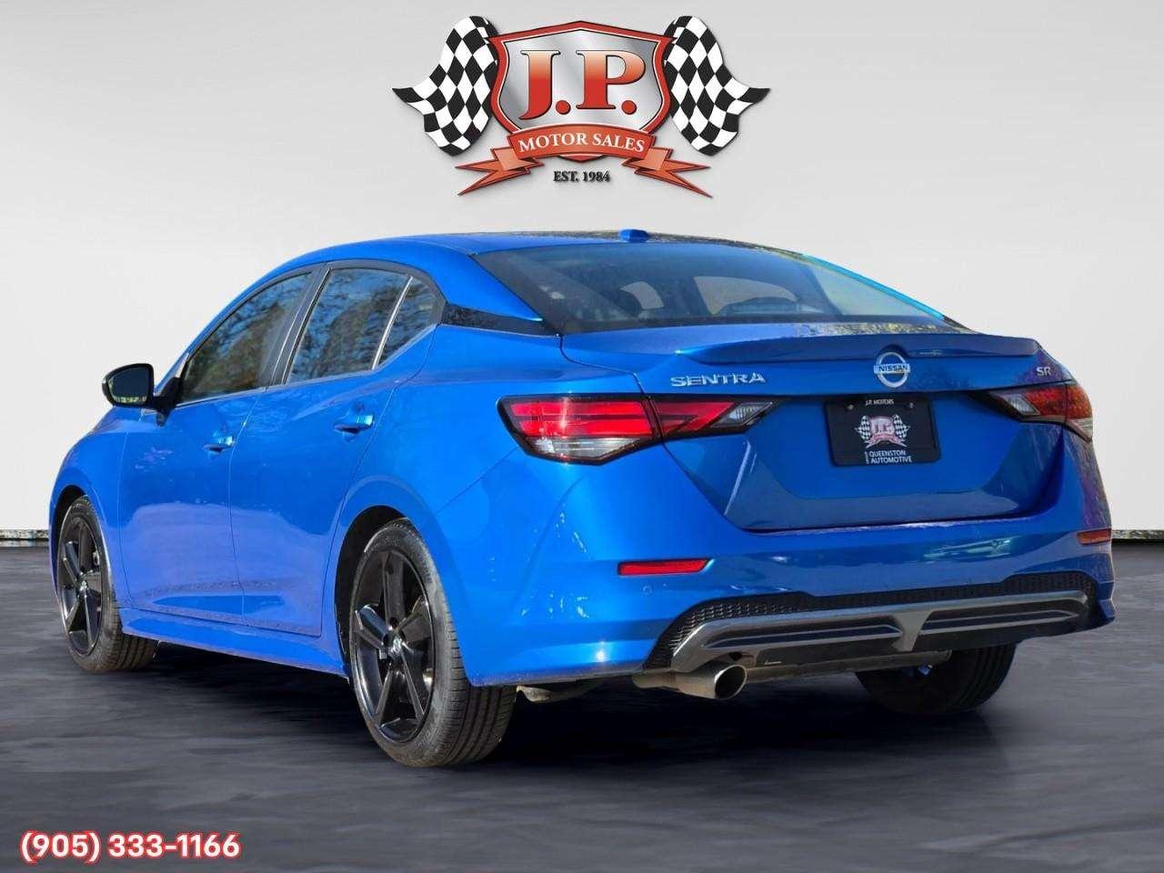 2023 Nissan Sentra SR Apple CarPlay & Android Auto • Power Sunroof • Heated Front Seats • Lane Assist • Rear Parking Sensors • SiriusXM® Sat Photo