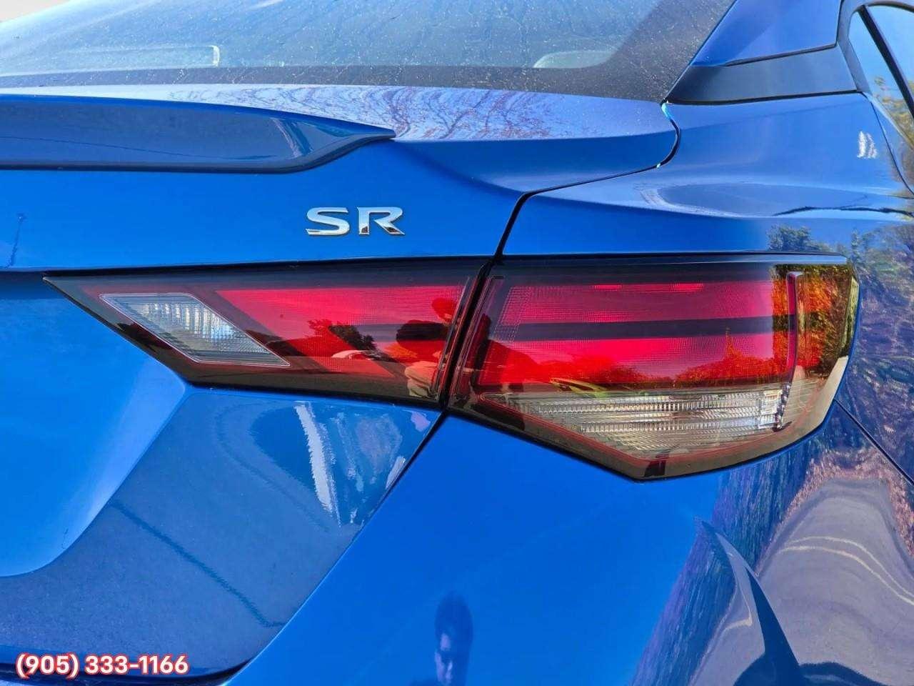 2023 Nissan Sentra SR Apple CarPlay & Android Auto • Power Sunroof • Heated Front Seats • Lane Assist • Rear Parking Sensors • SiriusXM® Sat Photo