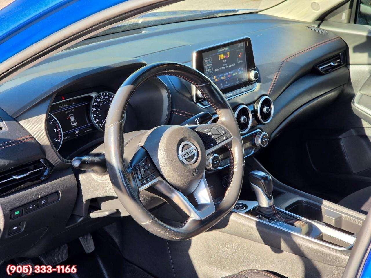 2023 Nissan Sentra SR Apple CarPlay & Android Auto • Power Sunroof • Heated Front Seats • Lane Assist • Rear Parking Sensors • SiriusXM® Sat Photo