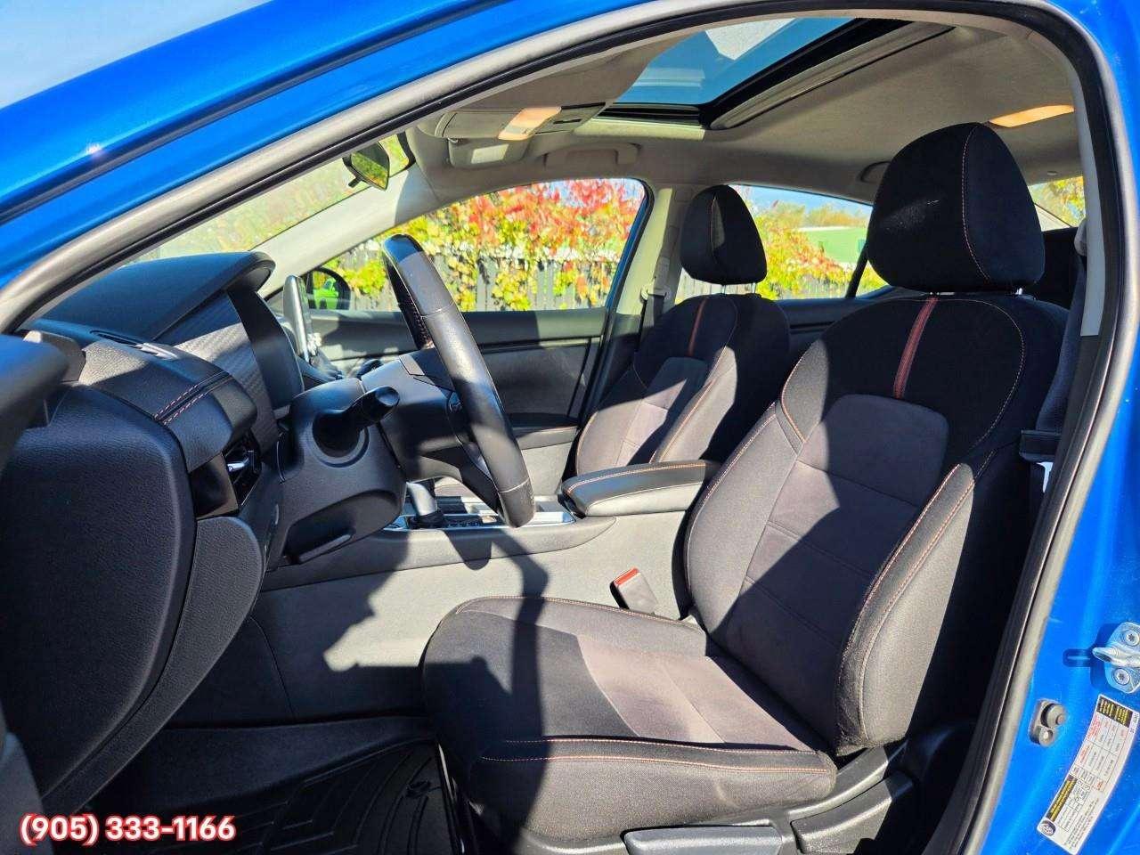 2023 Nissan Sentra SR Apple CarPlay & Android Auto • Power Sunroof • Heated Front Seats • Lane Assist • Rear Parking Sensors • SiriusXM® Sat Photo