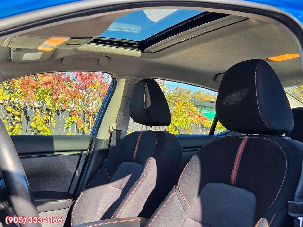 2023 Nissan Sentra SR Apple CarPlay & Android Auto • Power Sunroof • Heated Front Seats • Lane Assist • Rear Parking Sensors • SiriusXM® Sat Photo