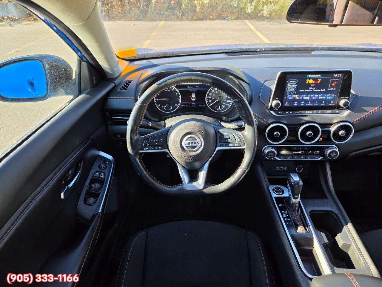 2023 Nissan Sentra SR Apple CarPlay & Android Auto • Power Sunroof • Heated Front Seats • Lane Assist • Rear Parking Sensors • SiriusXM® Sat Photo