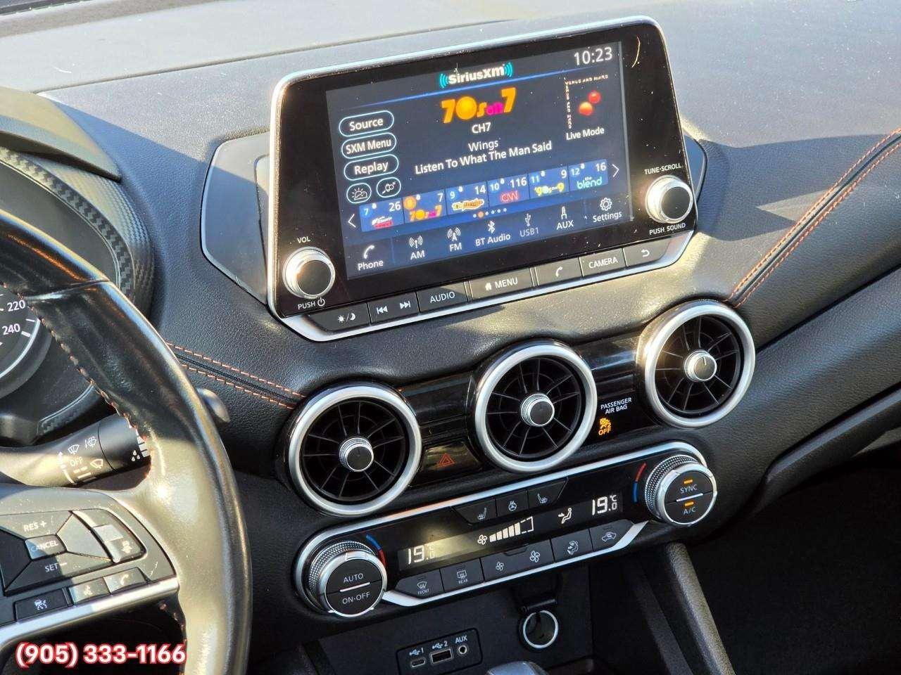 2023 Nissan Sentra SR Apple CarPlay & Android Auto • Power Sunroof • Heated Front Seats • Lane Assist • Rear Parking Sensors • SiriusXM® Sat Photo