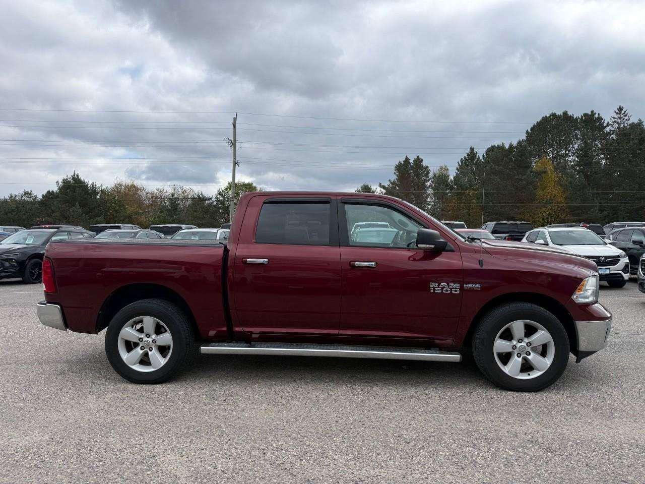 2017 RAM 1500 RUNNING BOARDS. TONNEAU COVER. HEATED OUTSIDE MIRRORS. SECOND ROW IN FLOOR STORAGE BINS. CERTIFIED. Photo