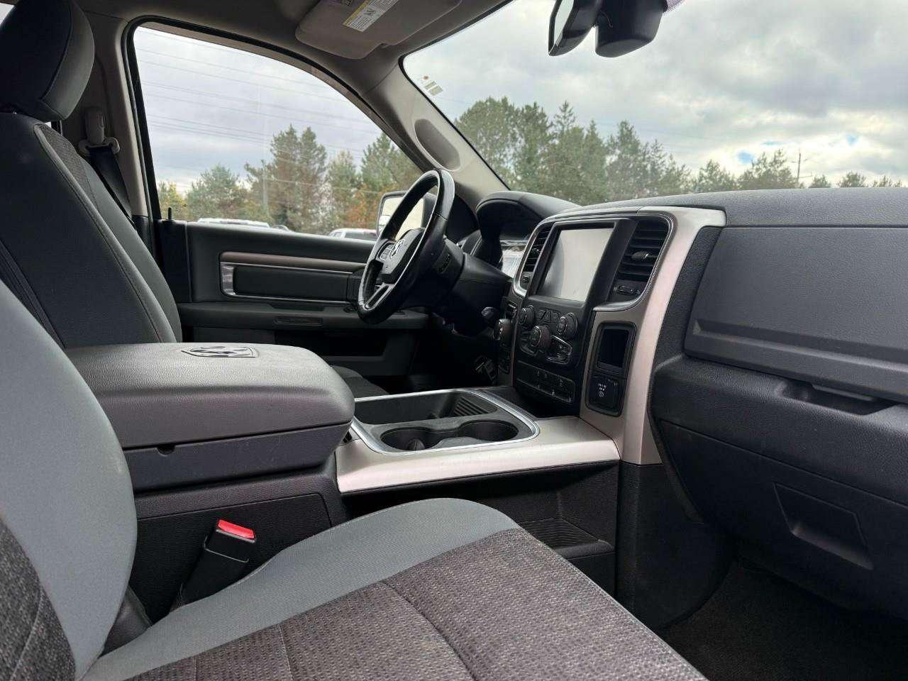 2017 RAM 1500 RUNNING BOARDS. TONNEAU COVER. HEATED OUTSIDE MIRRORS. SECOND ROW IN FLOOR STORAGE BINS. CERTIFIED. Photo