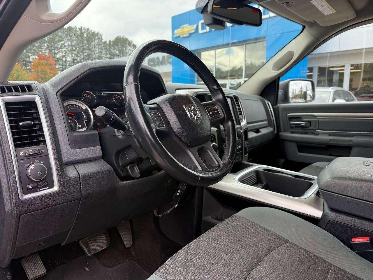 2017 RAM 1500 RUNNING BOARDS. TONNEAU COVER. HEATED OUTSIDE MIRRORS. SECOND ROW IN FLOOR STORAGE BINS. CERTIFIED. Photo