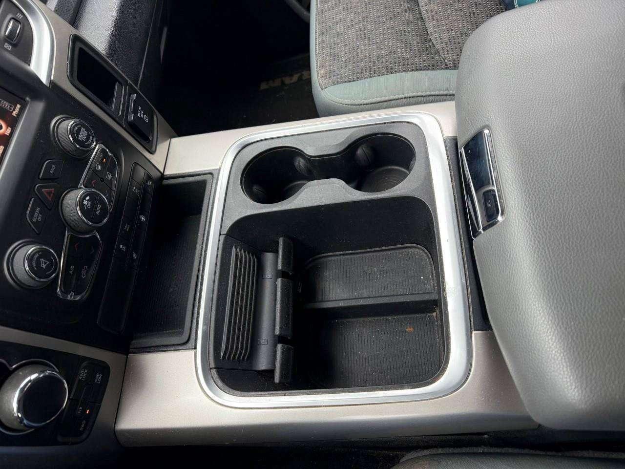 2017 RAM 1500 RUNNING BOARDS. TONNEAU COVER. HEATED OUTSIDE MIRRORS. SECOND ROW IN FLOOR STORAGE BINS. CERTIFIED. Photo