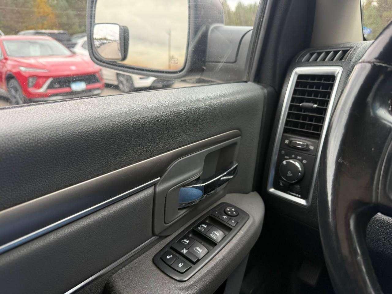 2017 RAM 1500 RUNNING BOARDS. TONNEAU COVER. HEATED OUTSIDE MIRRORS. SECOND ROW IN FLOOR STORAGE BINS. CERTIFIED. Photo