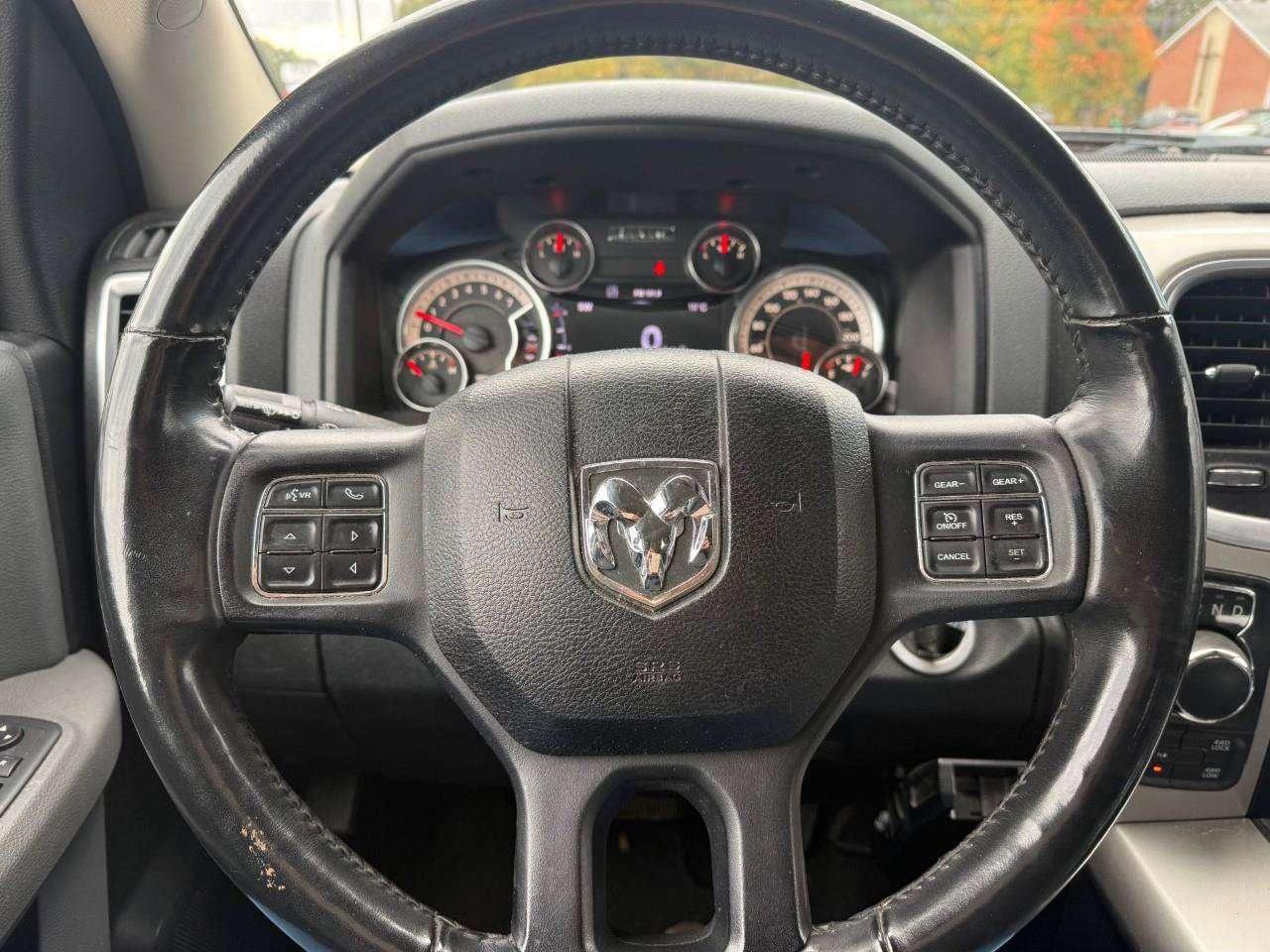 2017 RAM 1500 RUNNING BOARDS. TONNEAU COVER. HEATED OUTSIDE MIRRORS. SECOND ROW IN FLOOR STORAGE BINS. CERTIFIED. Photo