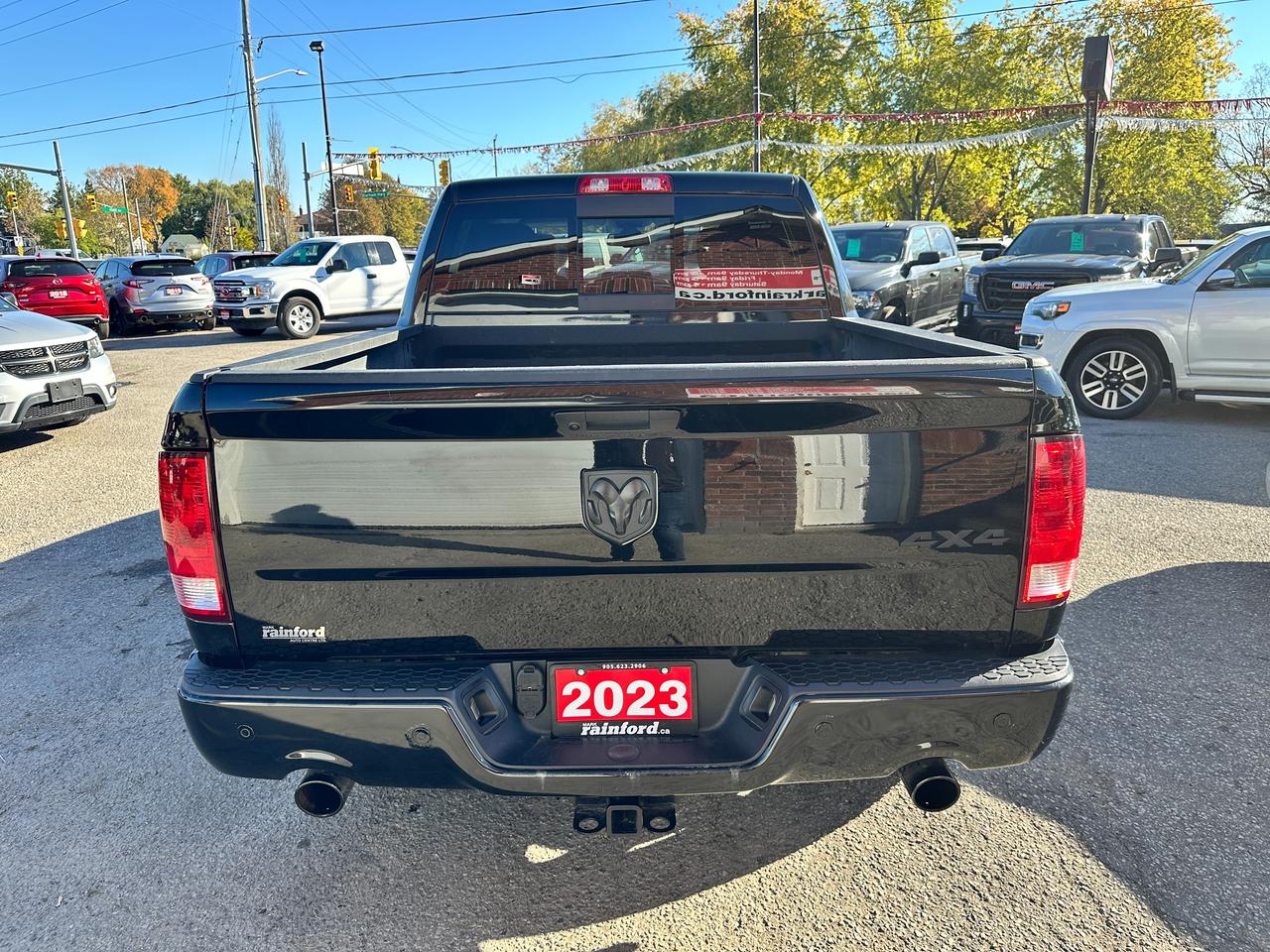 2023 RAM 1500 Classic SLT Crew 4x4 HEMI HTD-Cloth 6-Pass Bluetooth XM Photo