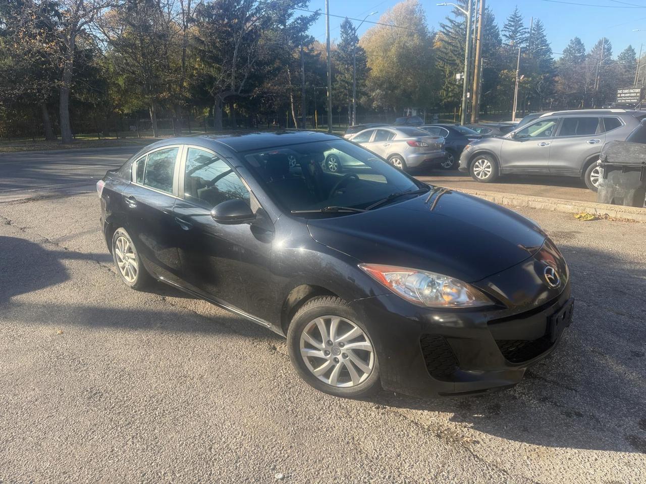 Black 2012 Mazda MAZDA3 Sedan  Automatic