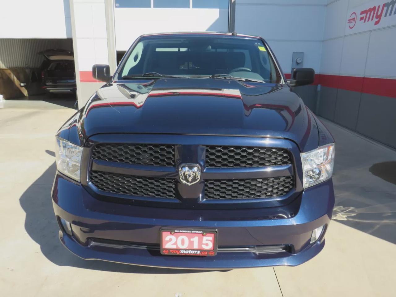 2015 RAM 1500 Express | RWD | Automatic | Regular Cab | Medium Bed 6'4\" | Chrome Wheels | Cruise Control | Air Conditioning Photo