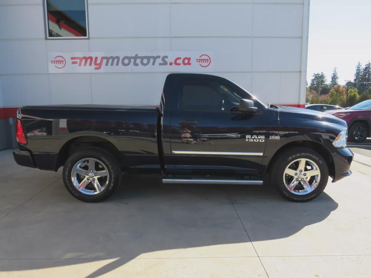 2015 RAM 1500 Express | RWD | Automatic | Regular Cab | Medium Bed 6'4\" | Chrome Wheels | Cruise Control | Air Conditioning Photo