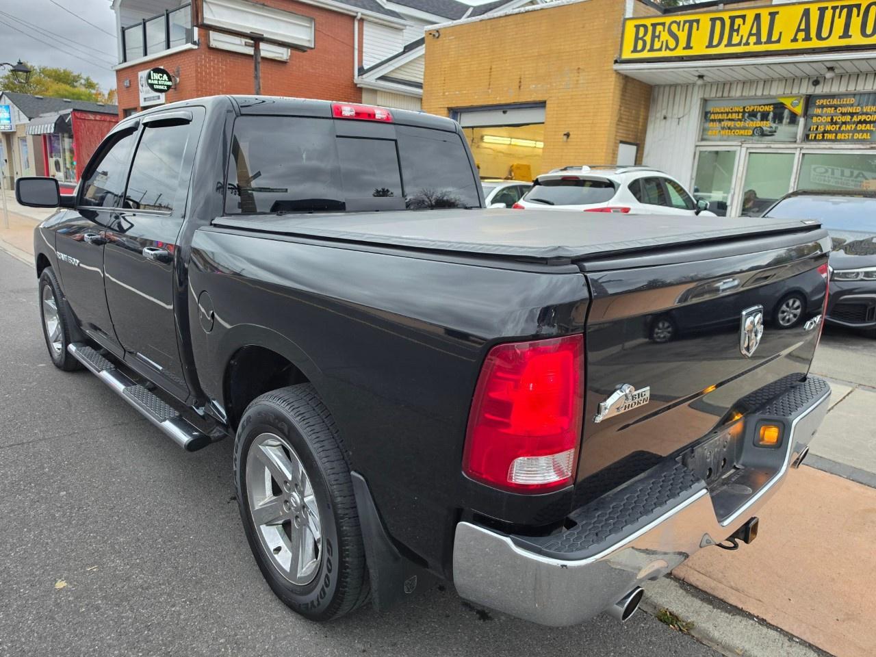 2012 RAM 1500 4WD Crew Cab 5.6 Ft Box Big Horn Photo
