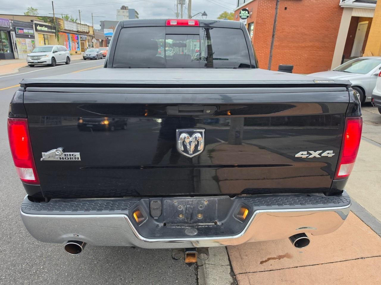 2012 RAM 1500 4WD Crew Cab 5.6 Ft Box Big Horn Photo