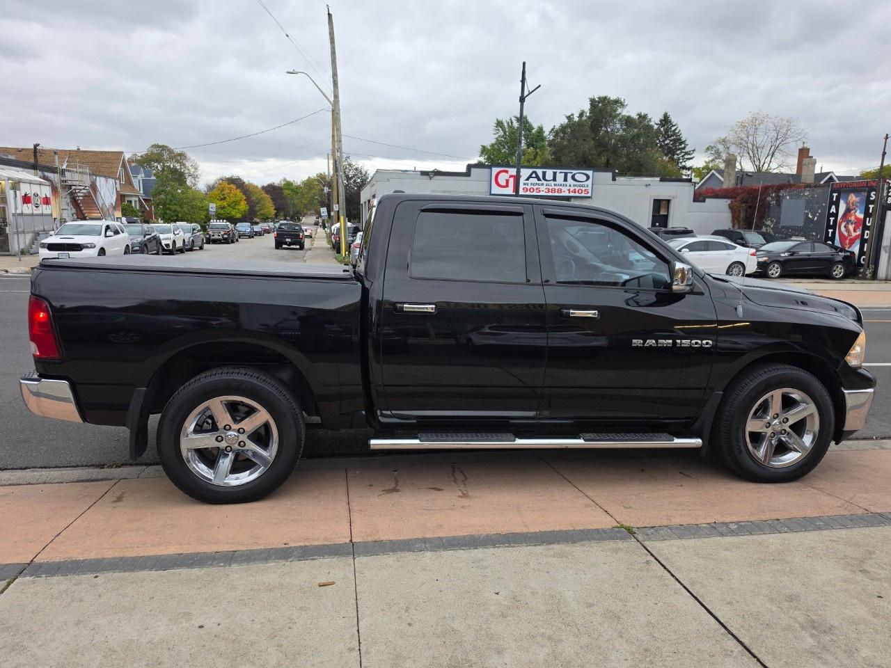 2012 RAM 1500 4WD Crew Cab 5.6 Ft Box Big Horn Photo