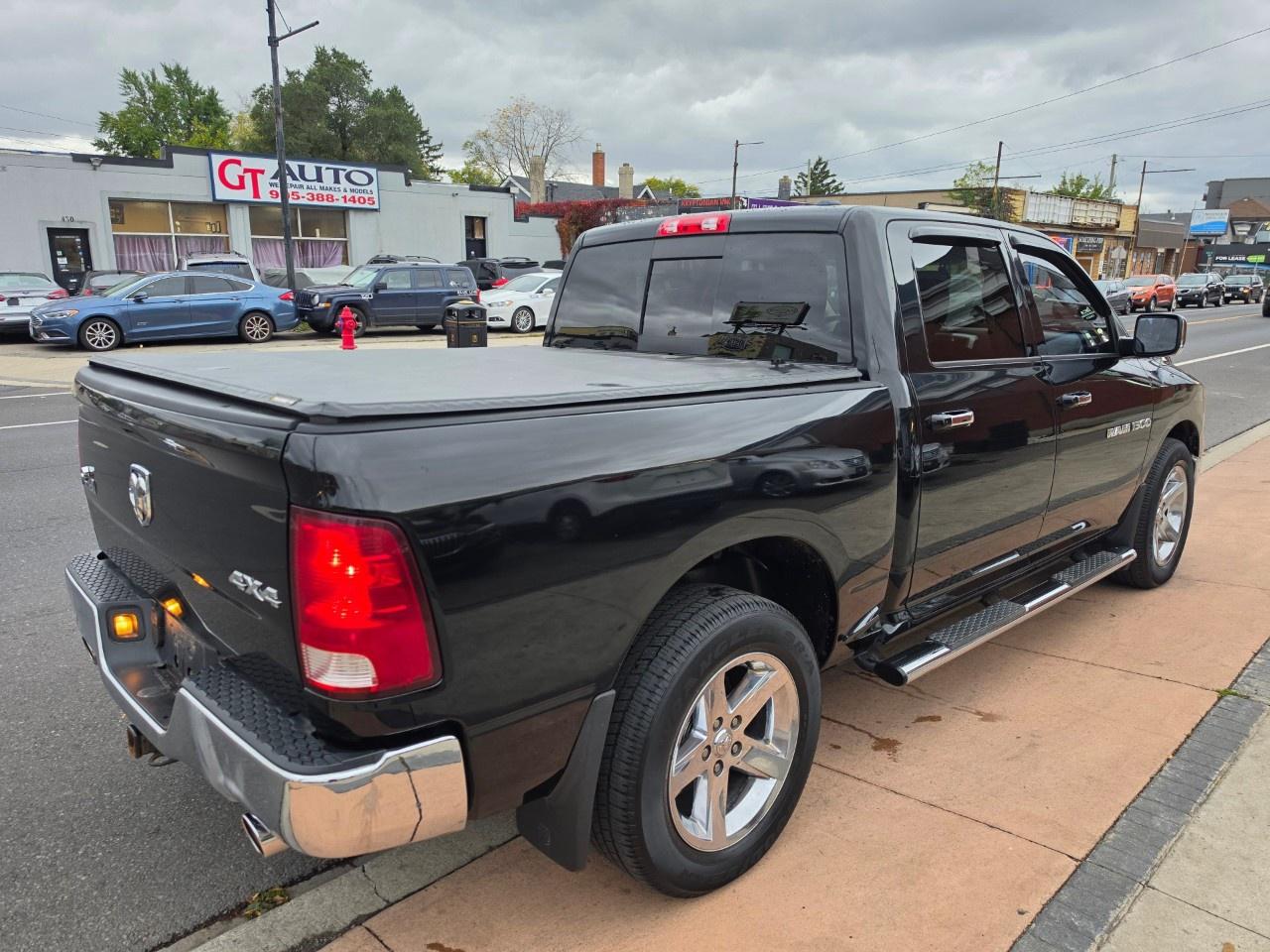 2012 RAM 1500 4WD Crew Cab 5.6 Ft Box Big Horn Photo