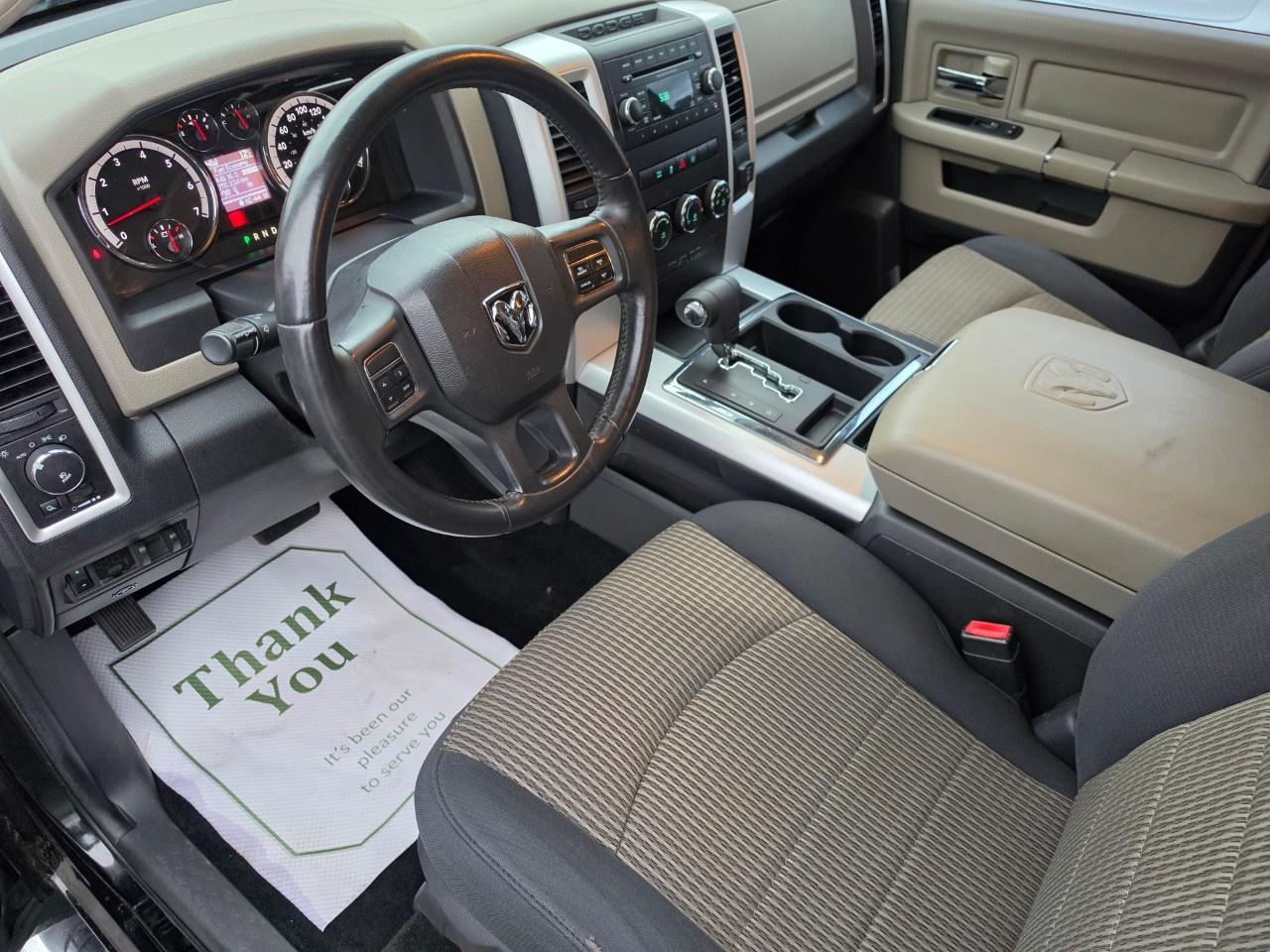 2012 RAM 1500 4WD Crew Cab 5.6 Ft Box Big Horn Photo