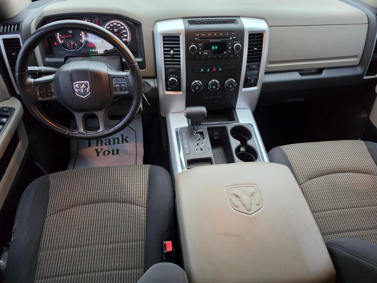 2012 RAM 1500 4WD Crew Cab 5.6 Ft Box Big Horn Photo