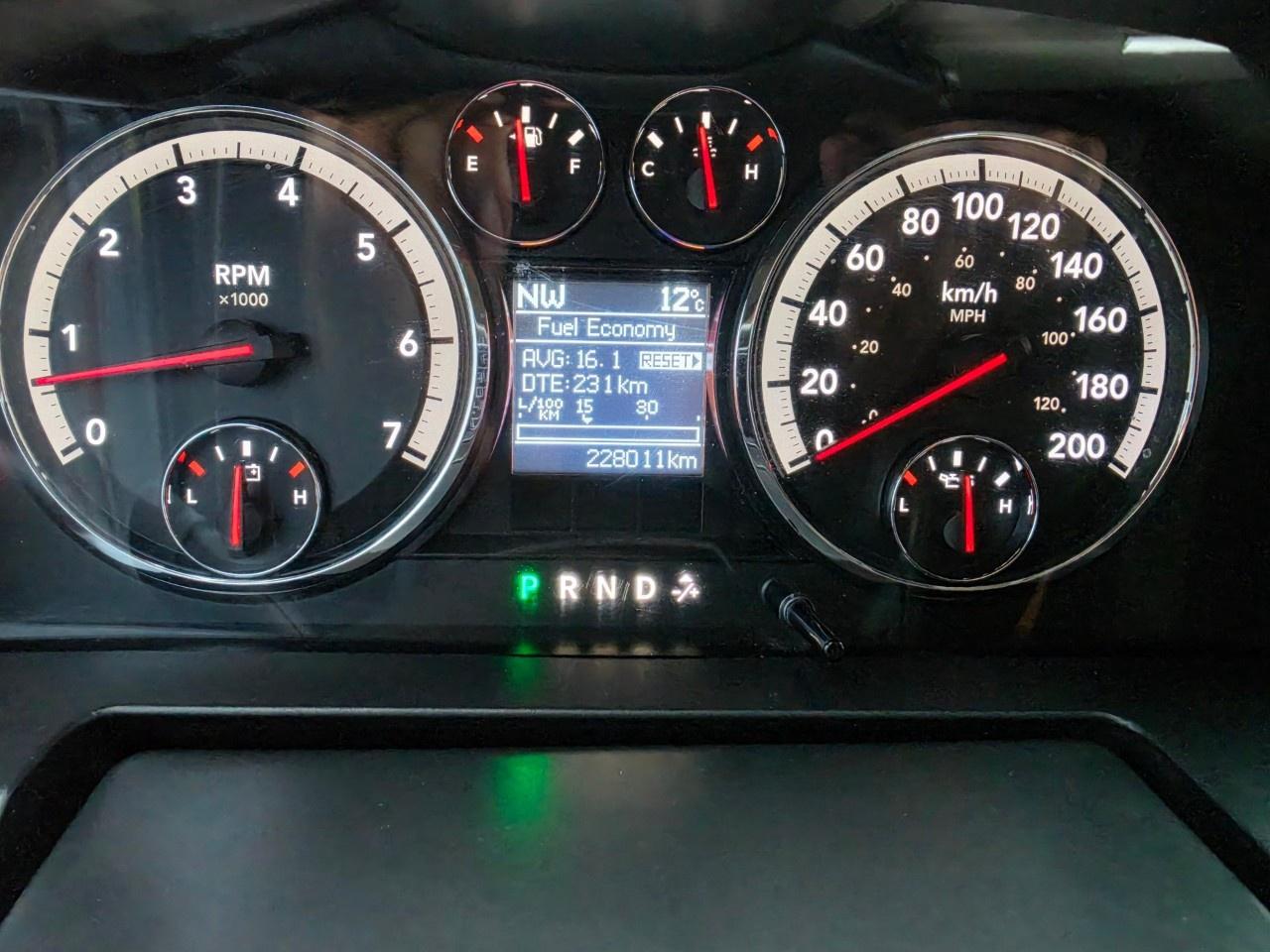 2012 RAM 1500 4WD Crew Cab 5.6 Ft Box Big Horn Photo
