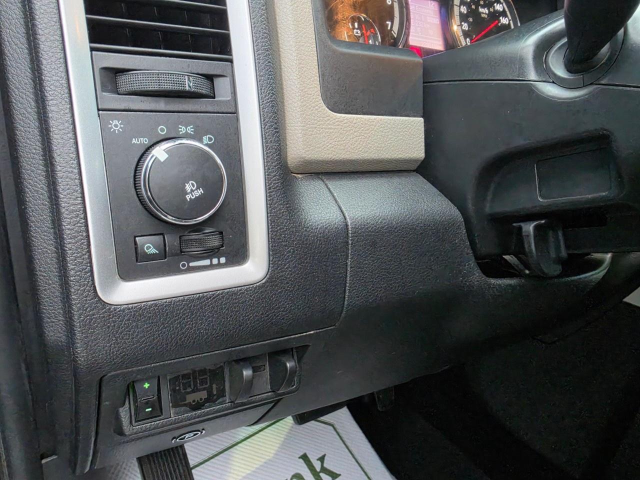 2012 RAM 1500 4WD Crew Cab 5.6 Ft Box Big Horn Photo