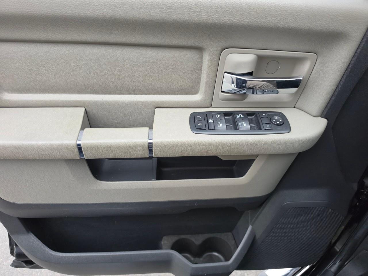 2012 RAM 1500 4WD Crew Cab 5.6 Ft Box Big Horn Photo