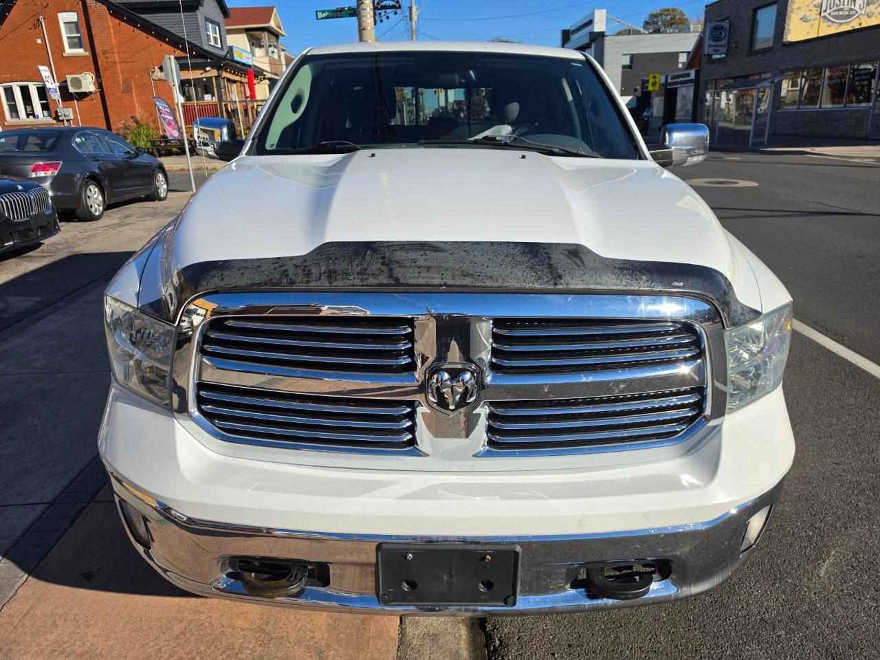 2014 RAM 1500 4WD Crew Cab 5.7 Ft Box Big Horn Photo