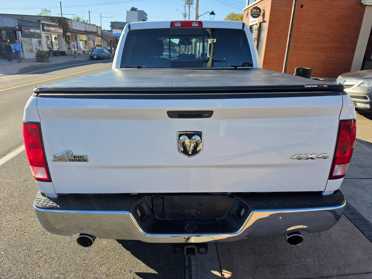 2014 RAM 1500 4WD Crew Cab 5.7 Ft Box Big Horn Photo