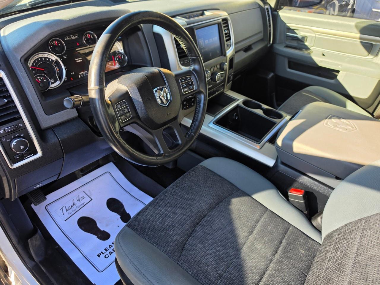 2014 RAM 1500 4WD Crew Cab 5.7 Ft Box Big Horn Photo