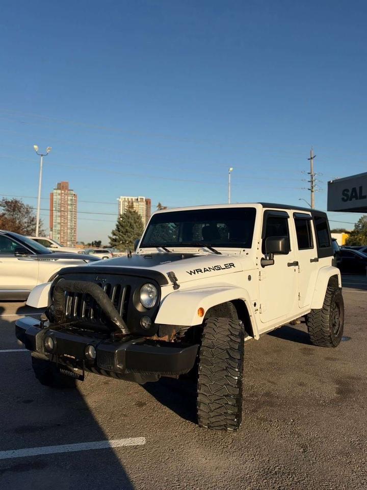 2016 Jeep Wrangler 4WD 4DR SAHARA Photo