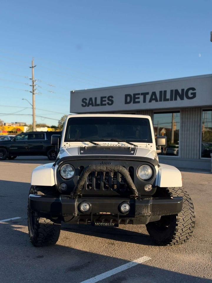 2016 Jeep Wrangler 4WD 4DR SAHARA Photo