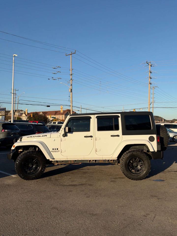 2016 Jeep Wrangler 4WD 4DR SAHARA Photo