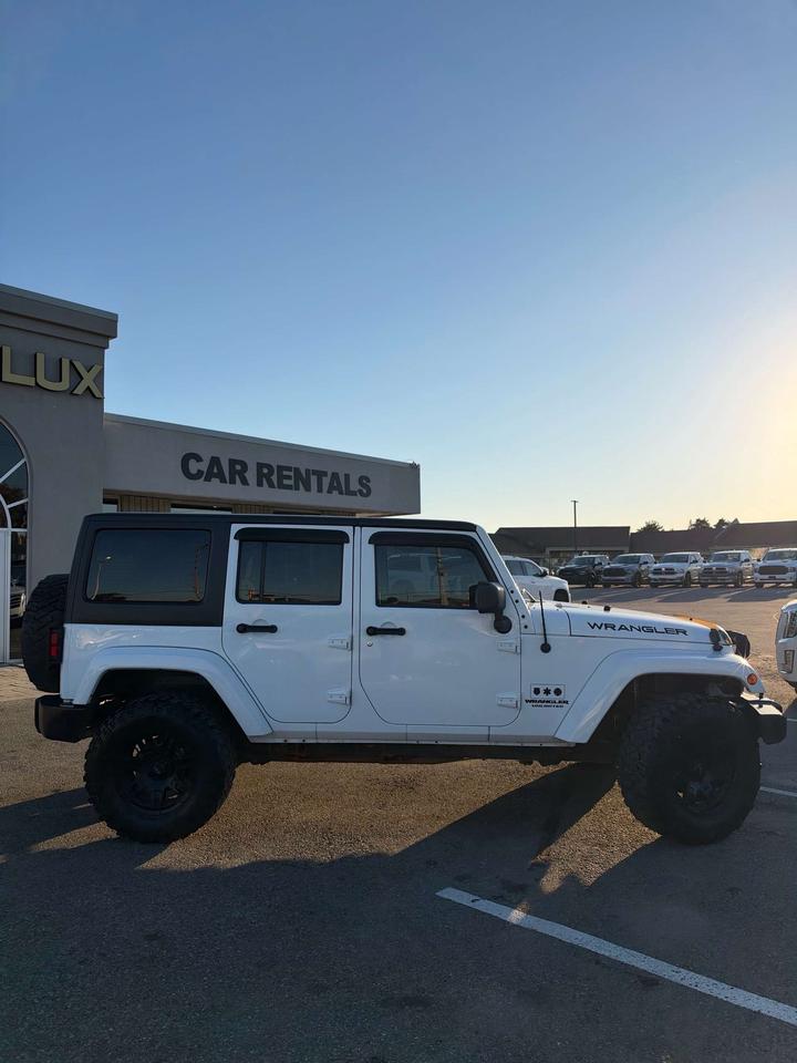 2016 Jeep Wrangler 4WD 4DR SAHARA Photo