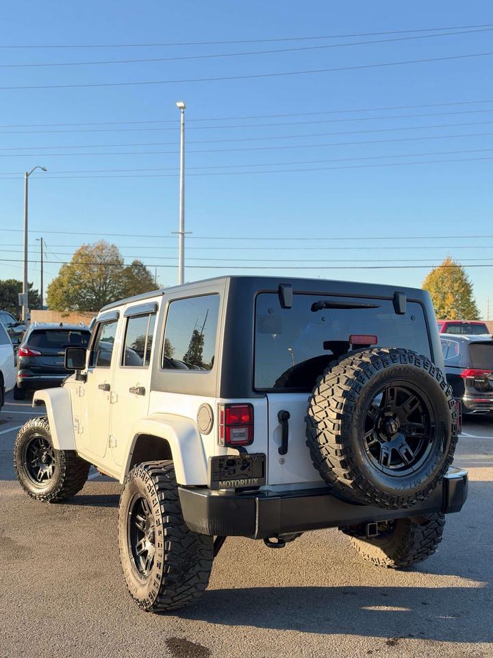 2016 Jeep Wrangler 4WD 4DR SAHARA Photo