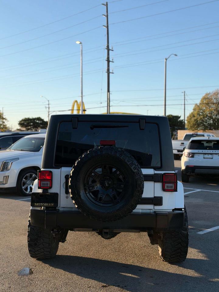 2016 Jeep Wrangler 4WD 4DR SAHARA Photo