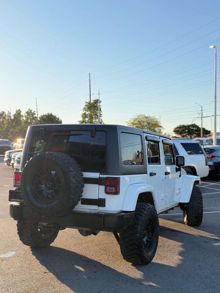 2016 Jeep Wrangler 4WD 4DR SAHARA Photo
