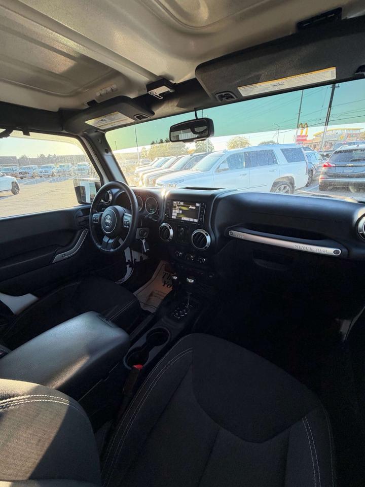 2016 Jeep Wrangler 4WD 4DR SAHARA Photo