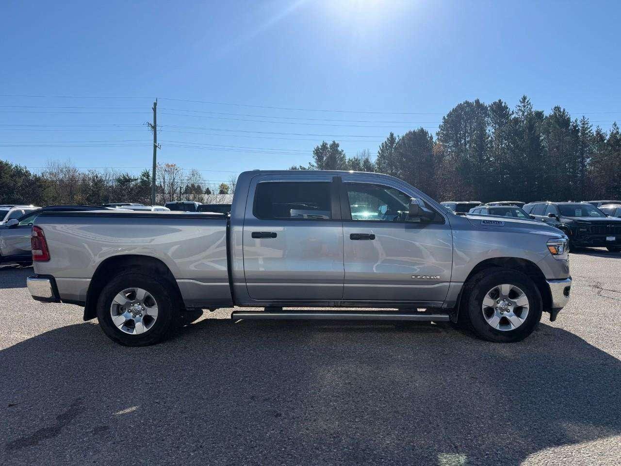 2023 RAM 1500 BEDLINER. RUNNING BOARDS. TONNEAU COVER. ALL WEATHER MATS. TRAILER TOW PKG. CERTIFIED. Photo