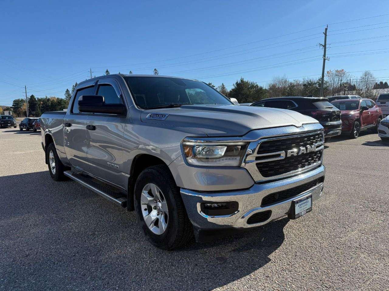 2023 RAM 1500 BEDLINER. RUNNING BOARDS. TONNEAU COVER. ALL WEATHER MATS. TRAILER TOW PKG. CERTIFIED. Photo