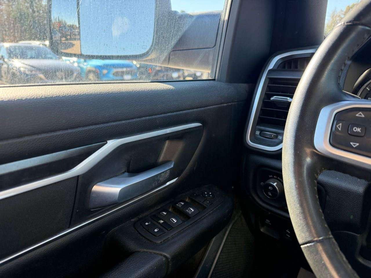 2023 RAM 1500 BEDLINER. RUNNING BOARDS. TONNEAU COVER. ALL WEATHER MATS. TRAILER TOW PKG. CERTIFIED. Photo