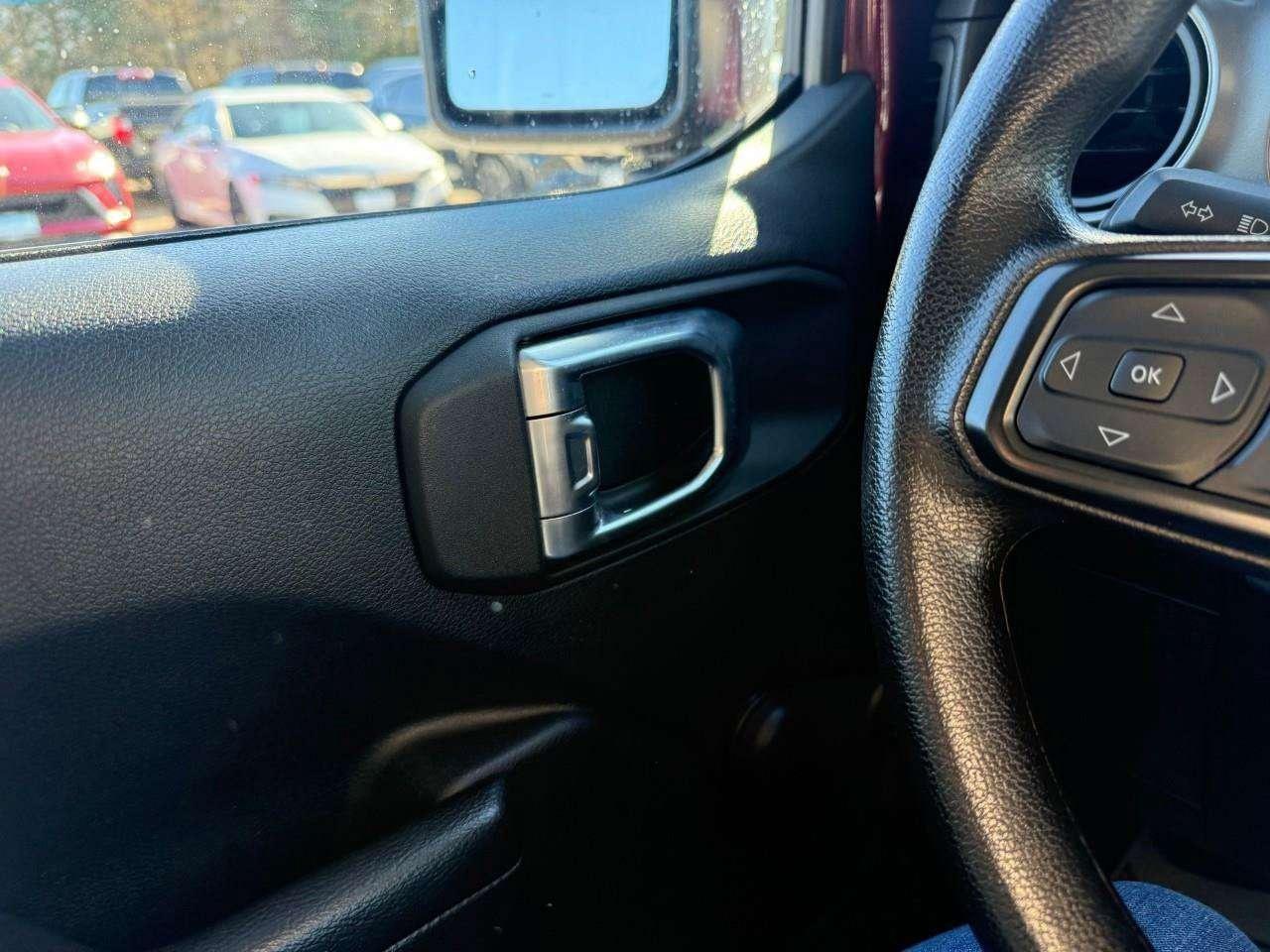 2022 Jeep Wrangler REMOVABLE TOP AND DOORS. 8 SPEAKER SOUND SYSTEM WITH OVERHEAD SOUND BAR. REAR BACK UP CAMERA. CERTIFIED. Photo