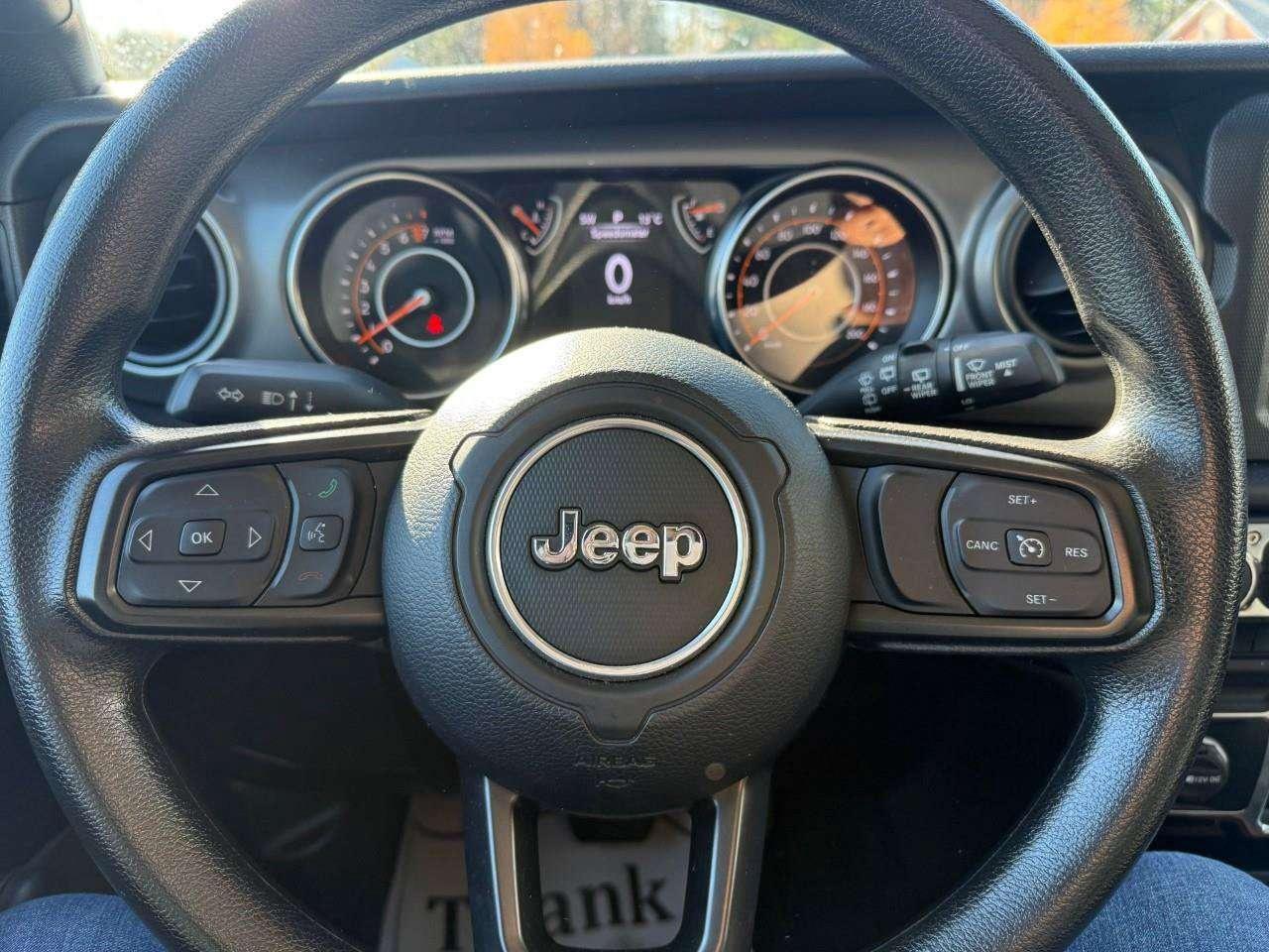2022 Jeep Wrangler REMOVABLE TOP AND DOORS. 8 SPEAKER SOUND SYSTEM WITH OVERHEAD SOUND BAR. REAR BACK UP CAMERA. CERTIFIED. Photo