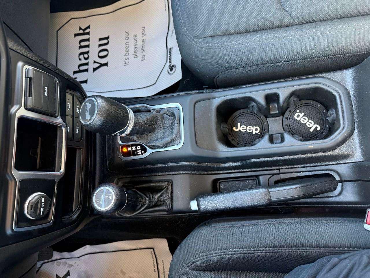 2022 Jeep Wrangler REMOVABLE TOP AND DOORS. 8 SPEAKER SOUND SYSTEM WITH OVERHEAD SOUND BAR. REAR BACK UP CAMERA. CERTIFIED. Photo