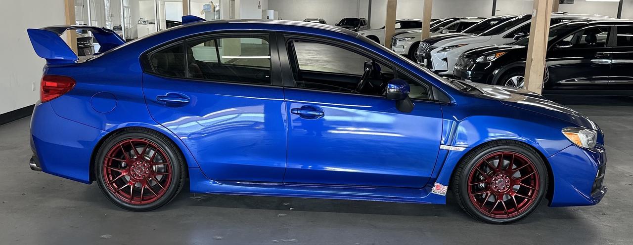 2017 Subaru WRX 4dr Sdn STI|MANUAL|TWO SETS OF KEYS|HEATED SEATS| Photo